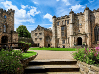 An outside view of Durham Castle on a sunny day