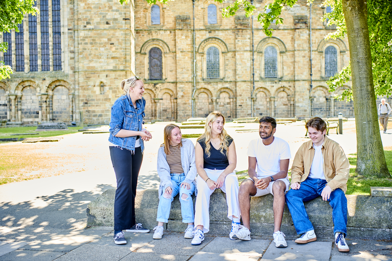 A group of students laughing together