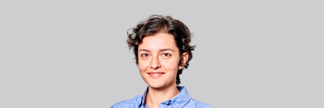 Head and shoulders shot of Allegra Franchino on a grey background