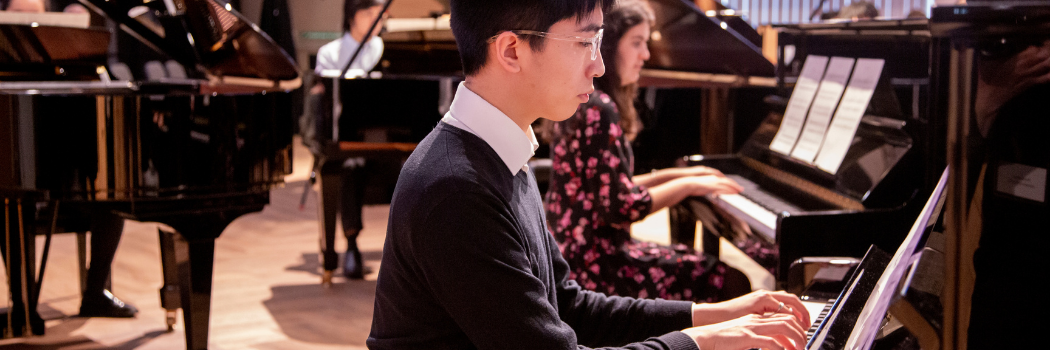 A person playing a piano