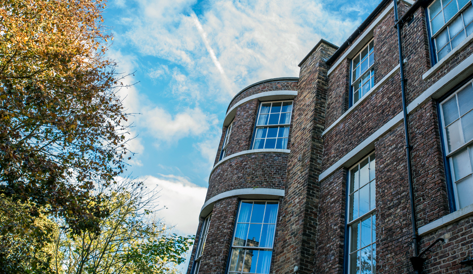 The exterior of Hatfield Rectory on a sunny autumn day