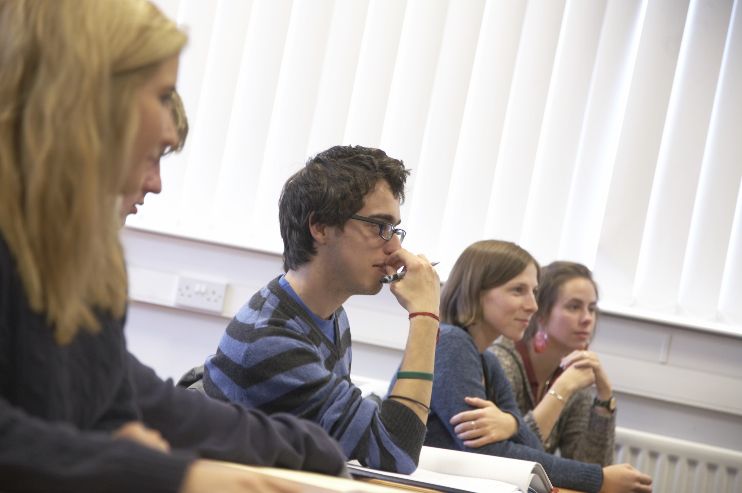 Students sat listening during a lecture on Queen's Campus.