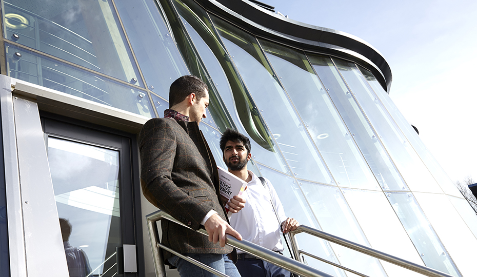 People exiting the Business School via the rear entrance