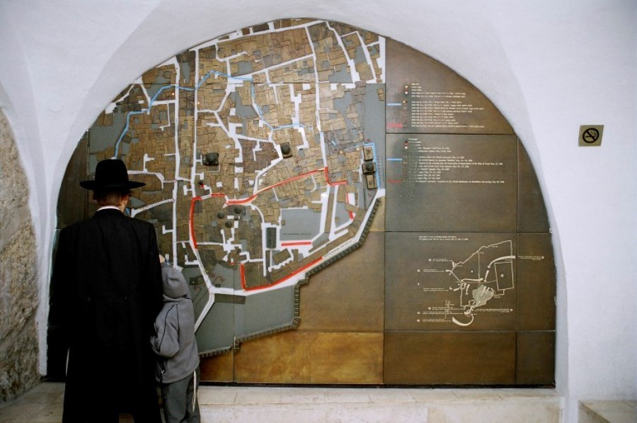 TA Jewish man and boy learning in a museum