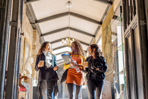 Three female students in Durham University campus