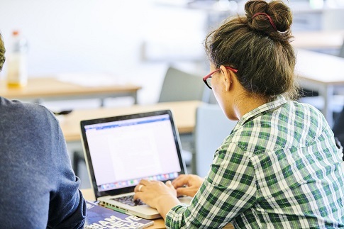 Student working on a laptop