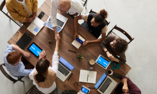 A group of business people around a table