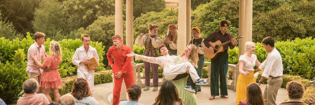 Students performing outside in the summer